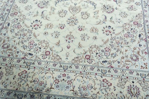 Close-up detail of 2000s Nain rug from Iran / Persia showing Wool weave