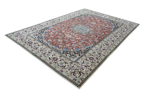 Corner detail of 2000s Nain rug showing border pattern and Wool pile