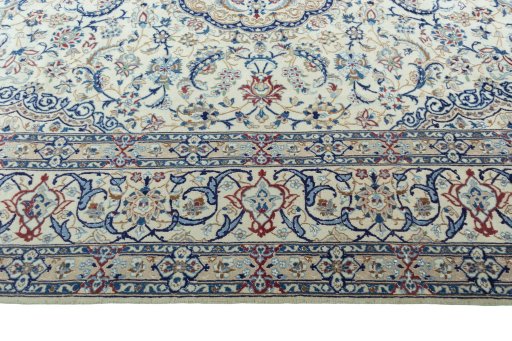 Corner detail of 2000s Nain rug showing border pattern and Wool pile