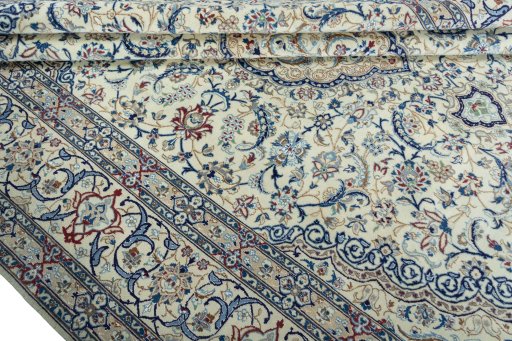 Close-up detail of 2000s Nain rug from Iran / Persia showing Wool weave
