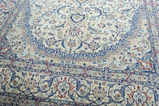 Close-up detail of 2000s Nain rug from Iran / Persia showing Wool weave