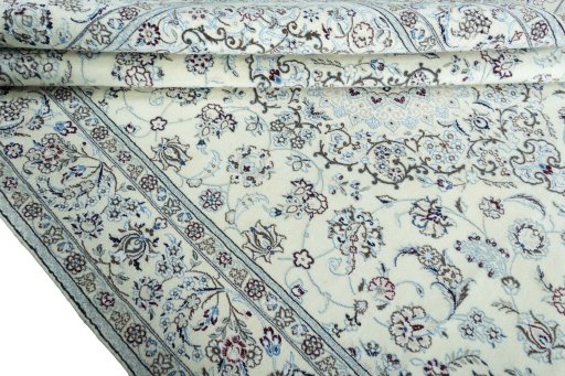 Close-up detail of 2000s Nain rug from Iran / Persia showing Wool weave