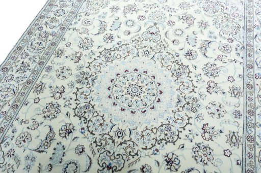 Backside of handmade 2000s Nain rug showing knot structure and weave density