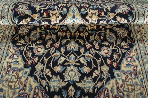 Close-up detail of 2000s Nain rug from Iran / Persia showing Wool weave