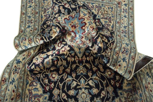 Surface texture of 2000s Nain rug with natural Wool and intricate pattern