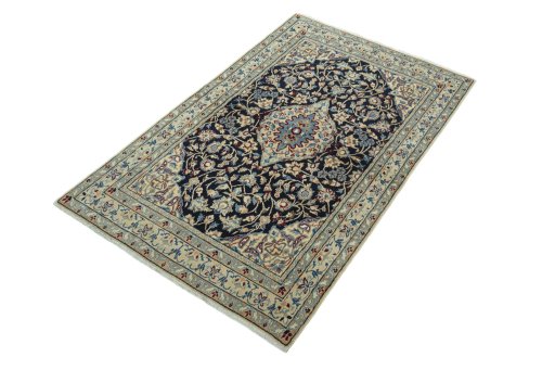 Corner detail of 2000s Nain rug showing border pattern and Wool pile