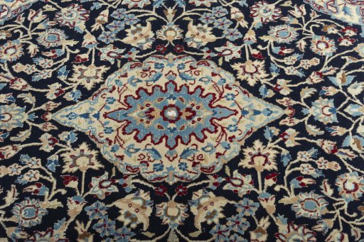 Central medallion detail of 2000s Nain rug from Iran / Persia