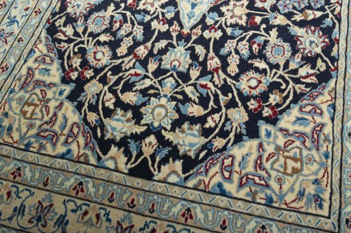 Close-up detail of 2000s Nain rug from Iran / Persia showing Wool weave