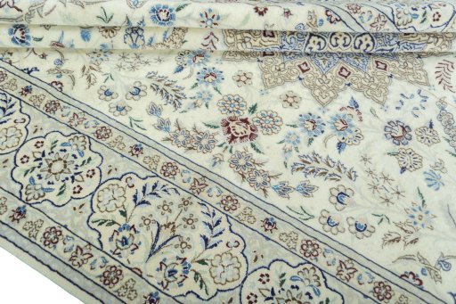 Close-up detail of 2000s Nain rug from Iran / Persia showing Wool weave