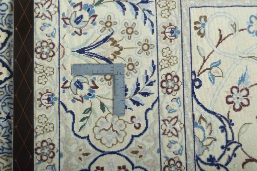 Backside of handmade 2000s Nain rug showing knot structure and weave density