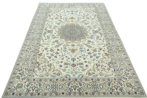 Surface texture of 2000s Nain rug with natural Wool and intricate pattern