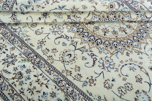 Close-up detail of 2000s Nain rug from Iran / Persia showing Wool weave