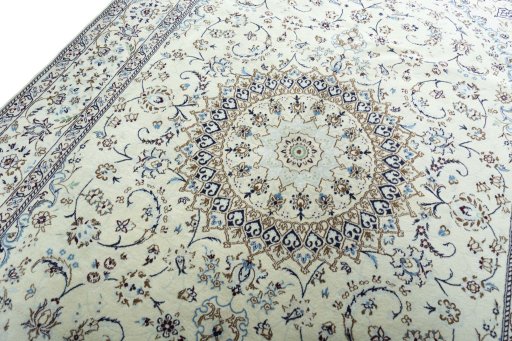 Backside of handmade 2000s Nain rug showing knot structure and weave density