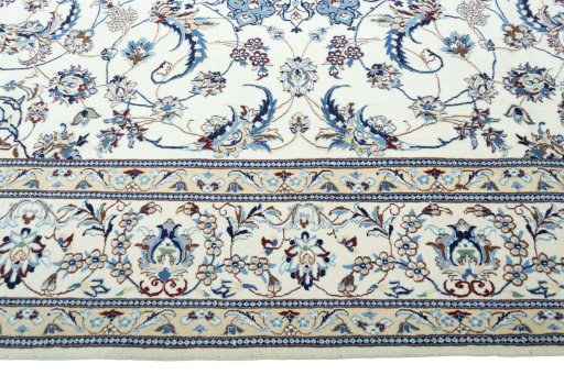 Corner detail of New Nain rug showing border pattern and Wool pile