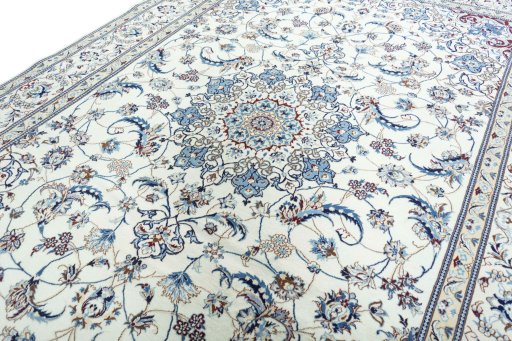 Backside of handmade New Nain rug showing knot structure and weave density