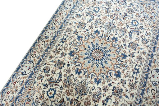 Backside of handmade 2000s Nain rug showing knot structure and weave density