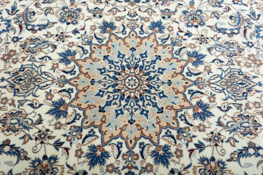 Central medallion detail of 2000s Nain rug from Iran / Persia