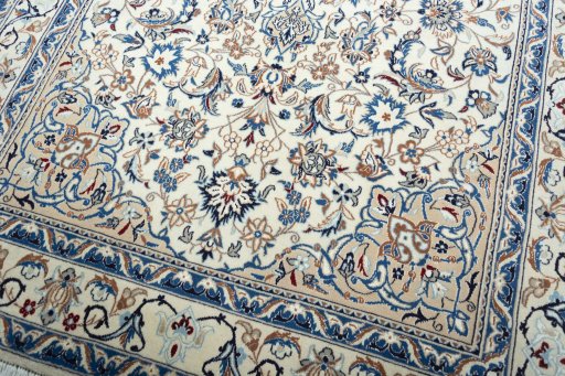 Close-up detail of 2000s Nain rug from Iran / Persia showing Wool weave