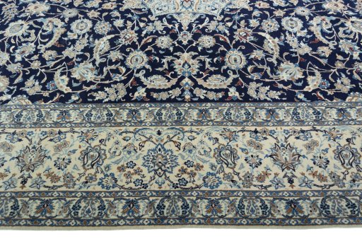 Corner detail of 2000s Nain rug showing border pattern and Wool pile
