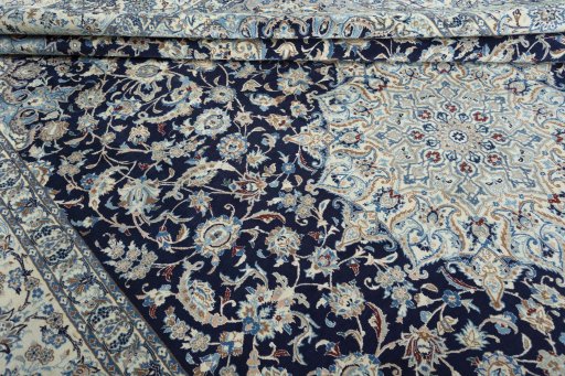 Close-up detail of 2000s Nain rug from Iran / Persia showing Wool weave