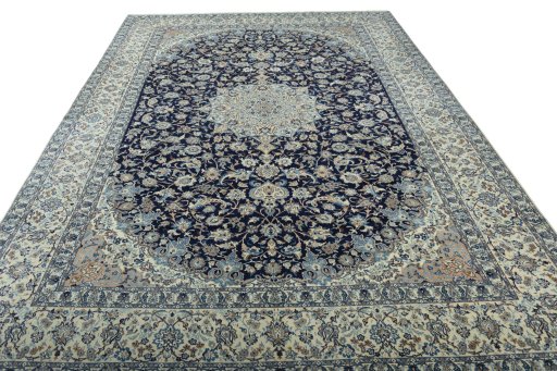 Surface texture of 2000s Nain rug with natural Wool and intricate pattern