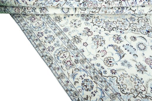 Close-up detail of 2000s Nain rug from Iran / Persia showing Wool weave