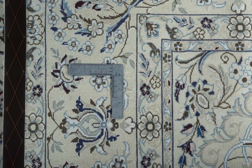 Backside of handmade 2000s Nain rug showing knot structure and weave density