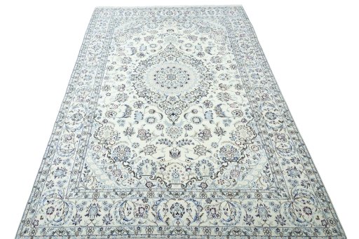 Surface texture of 2000s Nain rug with natural Wool and intricate pattern