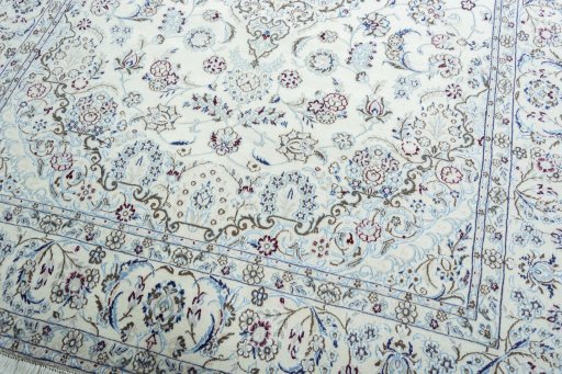 Close-up detail of 2000s Nain rug from Iran / Persia showing Wool weave