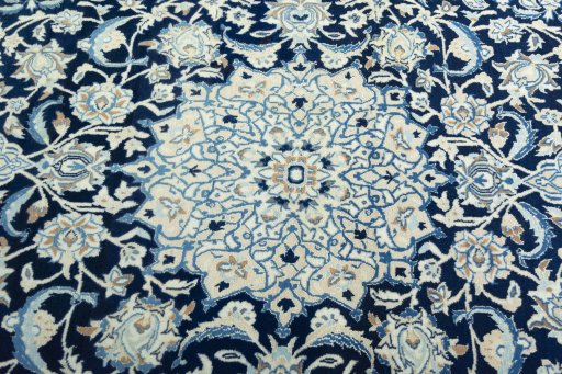 Central medallion detail of 2000s Nain rug from Iran / Persia