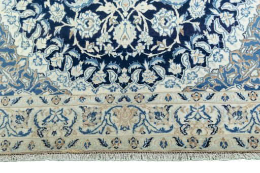 Close-up detail of 2000s Nain rug from Iran / Persia showing Wool weave