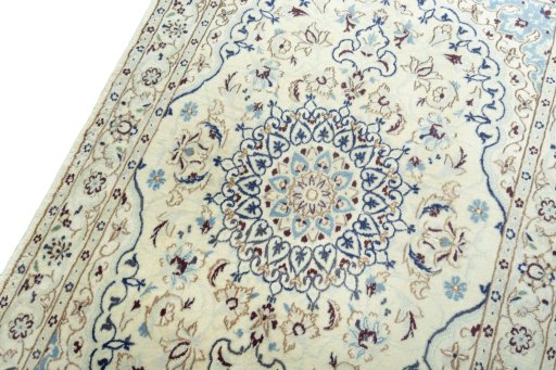 Backside of handmade 2000s Nain rug showing knot structure and weave density