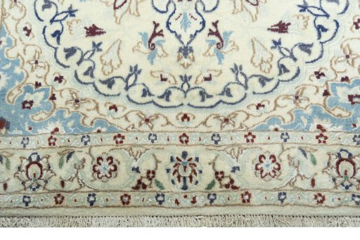 Close-up detail of 2000s Nain rug from Iran / Persia showing Wool weave