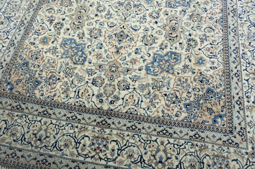 Backside of handmade 1970s Nain rug showing knot structure and weave density