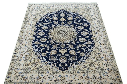 Surface texture of New Nain rug with natural Wool and intricate pattern