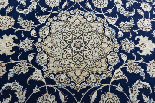 Central medallion detail of New Nain rug from Iran / Persia