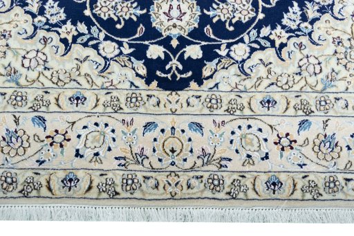 Close-up detail of New Nain rug from Iran / Persia showing Wool weave