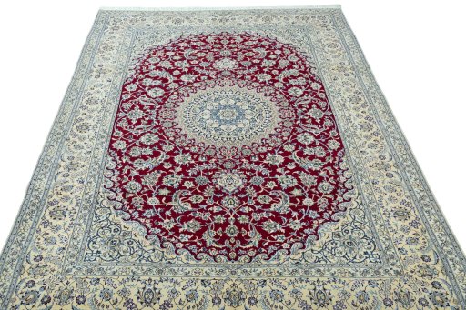 Surface texture of 2000s Nain rug with natural Wool and intricate pattern