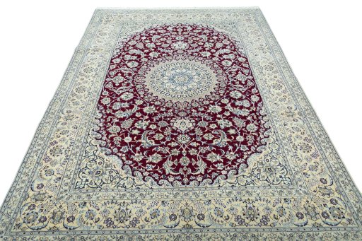 Surface texture of 2000s Nain rug with natural Wool and intricate pattern