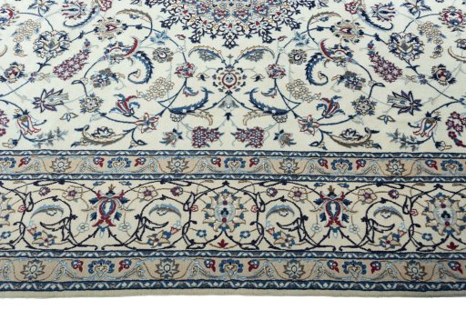 Corner detail of New Nain rug showing border pattern and Wool pile