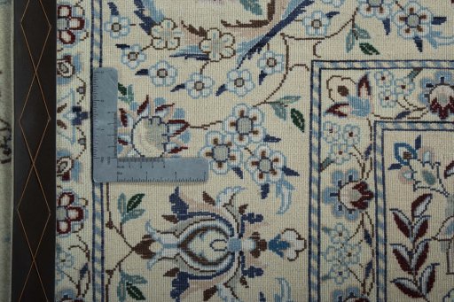 Backside of handmade 2000s Nain rug showing knot structure and weave density