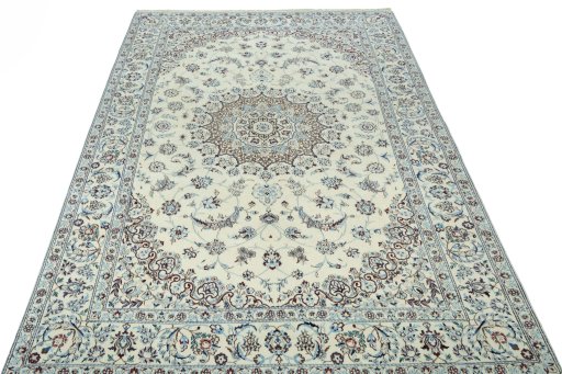 Surface texture of 2000s Nain rug with natural Wool and intricate pattern