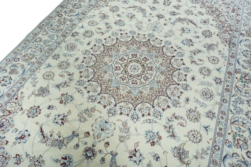 Backside of handmade 2000s Nain rug showing knot structure and weave density