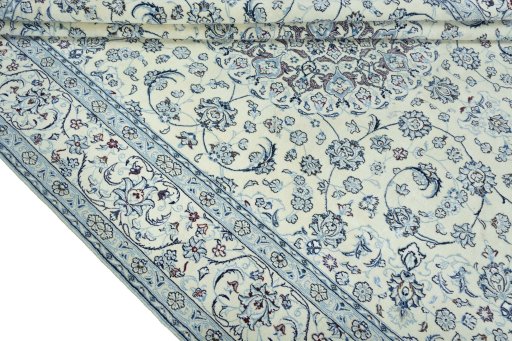 Close-up detail of 2000s Nain rug from Iran / Persia showing Wool weave
