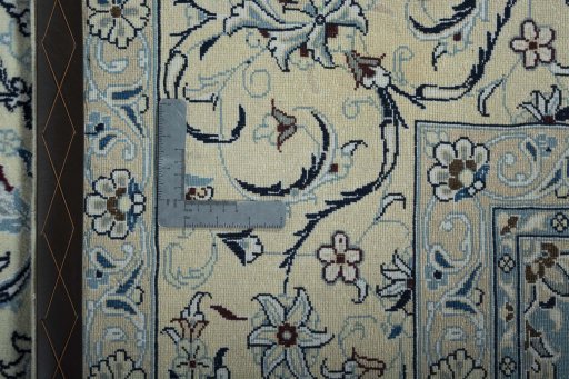 Backside of handmade 2000s Nain rug showing knot structure and weave density