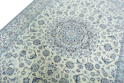 Backside of handmade 2000s Nain rug showing knot structure and weave density