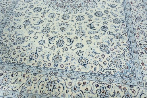 Close-up detail of 2000s Nain rug from Iran / Persia showing Wool weave