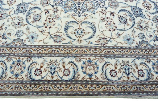 Corner detail of New Nain rug showing border pattern and Wool pile