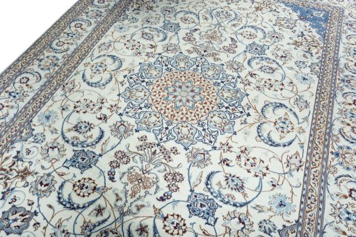 Backside of handmade New Nain rug showing knot structure and weave density