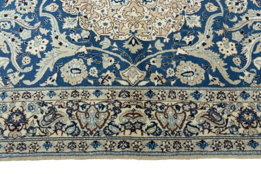 Corner detail of 1950s Nain rug showing border pattern and Cork pile